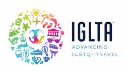IGLTA-logo, jonka alla lukee advancing LGBTQ+ travel.